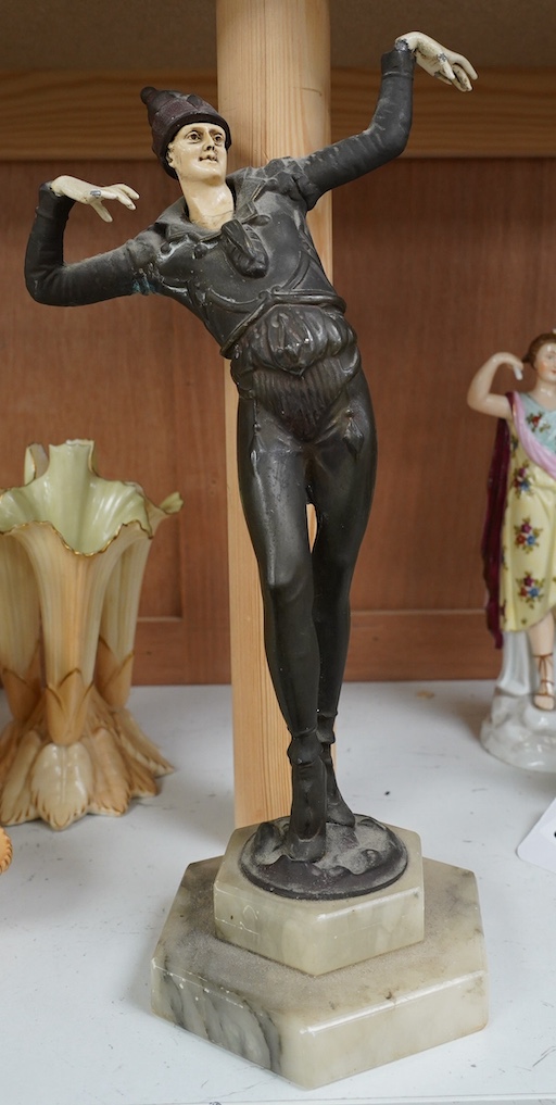 An Art Deco resin and patinated spelter model of a dancer on onyx base, 30cm. Condition - poor